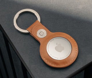 Tan Leather Apple AirTag Holder Keyring containing Apple AirTag