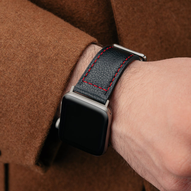 Man wearing the Black with Red stitching Leather Apple Watch Strap