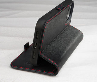 Integrated stand function of the Black (with Red Stitching) Leather Folio Stand Case for iPhone 14 Plus