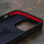 Geometric microfibre lined frame with advanced GEO-AS-3 protection of the Navy Blue Leather Bumper Case for iPhone 15 Pro