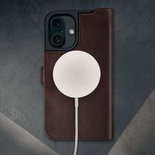 MagSafe charger on the Dark Brown Leather Case for iPhone 16