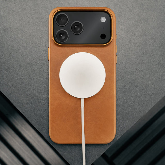 MagSafe charger attached to the Slimline Light Brown / Tan Leather Bumper Case for iPhone 17 Pro
